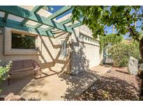 Inviting patio with pergola, seating, and landscaping at 4238 N 44Th St, Phoenix, AZ 85018