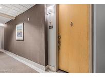 Residential hallway with carpeting and neutral walls at 16 W Encanto Blvd # 609, Phoenix, AZ 85003