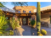 Spanish style home with courtyard entry and fountain at 35931 N 82Nd Pl, Scottsdale, AZ 85266