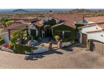 Luxury home with a courtyard, fountain, and mountain views at 4362 N Diamond Point Cir, Mesa, AZ 85207