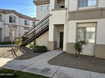 Building exterior with walkway and landscaping at 1941 S Pierpont Dr # 1090, Mesa, AZ 85206