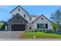 Stunning two-story home with a modern farmhouse design and landscaped lawn at 4511 N 38Th Pl, Phoenix, AZ 85018