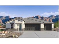 New two-car garage home with desert landscape and mountain views at 9913 S Los Picos Dr, Apache Junction, AZ 85120