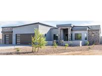 Stunning modern home with two-car garage and attractive landscaping at 103 E Quartz Rock Rd, Phoenix, AZ 85085