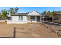 Charming bungalow with a newly renovated exterior and landscaping at 3212 W Jackson St, Phoenix, AZ 85009