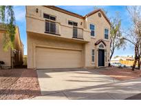 Two-story house with attached garage and desert landscaping at 5910 S Colonial Way, Tempe, AZ 85283