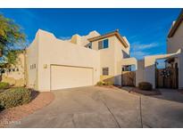 Two-story home with attached garage and gated entry at 544 N Alma School Rd # 8, Mesa, AZ 85201