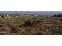 Aerial view of a luxury community nestled in a mountainous region at 15848 E Palomino Blvd, Fountain Hills, AZ 85268