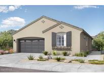 Single-story house with gray garage door and landscaping at 14443 W Sand Hills Rd, Surprise, AZ 85387