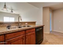 Modern kitchen with granite countertops and stainless steel appliances at 5450 E Deer Valley Dr # 4201, Phoenix, AZ 85054