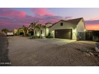 Beautiful desert home exterior at sunset at 10283 E Fortuna Ave, Gold Canyon, AZ 85118