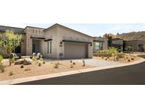 Modern home with a two-car garage and landscaped front yard at 23491 N 125Th Pl, Scottsdale, AZ 85255