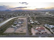 Aerial view of a luxury home community with expansive desert landscape at 12331 E Gold Dust Ave, Scottsdale, AZ 85259