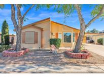 Single-story home with landscaped yard and carport at 8500 E Southern Ave # 509, Mesa, AZ 85209