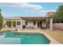 Private backyard with refreshing pool, patio, and seating at 26616 N 42Nd Way, Cave Creek, AZ 85331