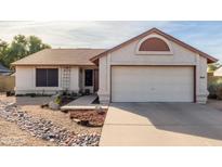 One-story house with a two-car garage and landscaped front yard at 5519 W Elgin St, Chandler, AZ 85226