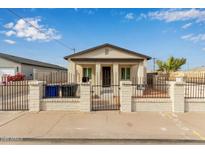 Newly renovated craftsman home with a fenced front yard at 562 N Lewis --, Mesa, AZ 85201