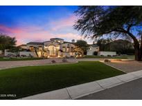 Stunning Spanish-style home with gated entry and landscaped grounds at 6601 E Valley Vista Ln, Paradise Valley, AZ 85253