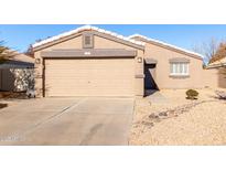 Single-story home with attached garage and desert landscaping at 1710 E Palo Verde St, Gilbert, AZ 85296