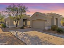 Single-story home with a two-car garage and desert landscaping at 4739 E Casey Ln, Cave Creek, AZ 85331