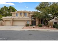 Two-story house with a large yard and two-car garage at 6210 W Foothill Dr, Glendale, AZ 85310