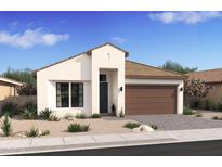 Single-story home with a brown garage door and desert landscaping at 671 E Greenback Dr, San Tan Valley, AZ 85140