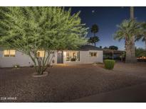 Charming single-story home with a well-manicured front yard at 8227 E Hubbell St, Scottsdale, AZ 85257