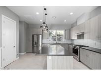 Modern kitchen with stainless steel appliances at 1717 E Morten Ave # 23, Phoenix, AZ 85020
