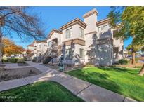 Attractive two-story building with landscaping and walkway at 1941 S Pierpont Dr # 1121, Mesa, AZ 85206