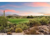 Stunning golf course view with desert landscape at sunset at 36601 N Mule Train Rd # D1, Carefree, AZ 85377