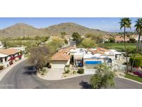 Luxury home community nestled against mountain backdrop, offering stunning views and a serene atmosphere at 4602 E Monte Way, Phoenix, AZ 85044