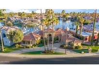 Luxury home on the lake with a private boat dock and beautiful landscaping at 10489 N 99Th St, Scottsdale, AZ 85258