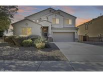 Two-story house with a large driveway and landscaping at 24710 N 27Th Pl, Phoenix, AZ 85024