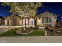 Attractive single-story home with landscaped yard and two-car garage at 13455 W Miner Trl, Peoria, AZ 85383