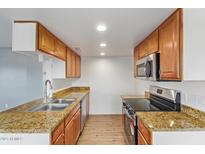 Modern kitchen with stainless steel appliances at 17042 E Calle Del Oro -- # D, Fountain Hills, AZ 85268