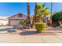 Beautiful desert landscaping enhances this charming home's curb appeal at 1269 N Layman St, Gilbert, AZ 85233