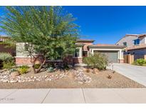 Beautiful house exterior with landscaping and a two-car garage at 1536 W Blaylock Dr, Phoenix, AZ 85085