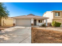 One-story home with gray garage door and landscaping at 1749 W Desert Mountain Dr, San Tan Valley, AZ 85144