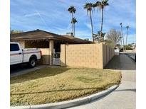 Ranch-style home with carport and fenced yard at 1844 S Toltec --, Mesa, AZ 85204