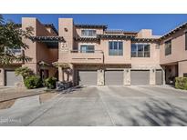 Attractive two-story building with multiple units and attached garages at 20660 N 40Th St # 2140, Phoenix, AZ 85050