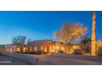 Desert landscape home with stucco exterior, landscaped grounds, and mountain views at 30600 N Pima Rd # 33, Scottsdale, AZ 85266