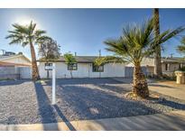 Recently updated home with fresh paint, new landscaping and a spacious front yard at 5538 N 63Rd Ave, Glendale, AZ 85301