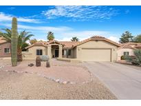 Single-story home with desert landscaping and two-car garage at 17014 E De Anza Dr, Fountain Hills, AZ 85268