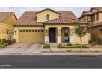 Beautiful Spanish style home with a 2 car garage and landscaped front yard at 4362 E Clifton Ave, Gilbert, AZ 85295