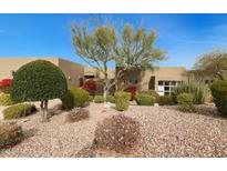 Landscaped front yard with drought-tolerant plants and gravel at 15234 E Sundown Dr, Fountain Hills, AZ 85268