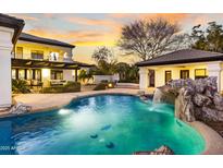 Inviting pool and spa with waterfall feature at 2543 E Linda Ln, Gilbert, AZ 85234