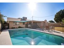 Inviting swimming pool in the backyard at 4016 W Myrtle Ave, Phoenix, AZ 85051