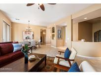 Open living room featuring comfortable seating and a coffee table at 19475 N Grayhawk Dr # 2169, Scottsdale, AZ 85255