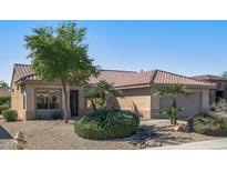 Single-story home with desert landscaping and two-car garage at 15113 W Cactus Ridge Way, Surprise, AZ 85374