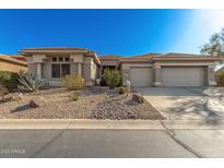 Single-story home with desert landscaping and two-car garage at 31847 N 53Rd St, Cave Creek, AZ 85331